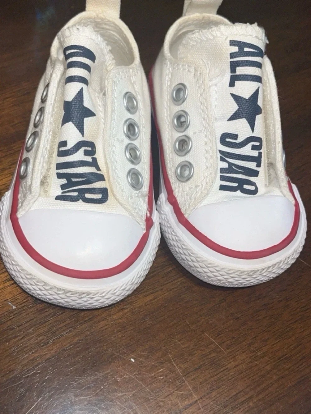 Converse Kids Canvas Slip-On Sneakers in Cream with Red Trim